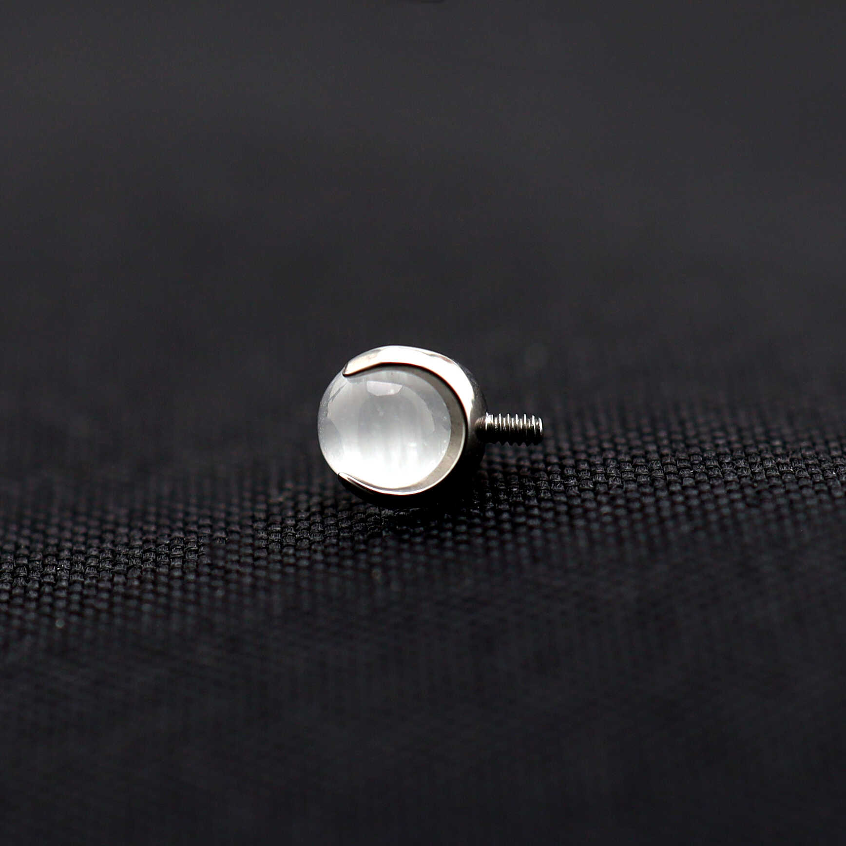Translucent Cat's Eye Internally Threaded Titanium Studs ph1