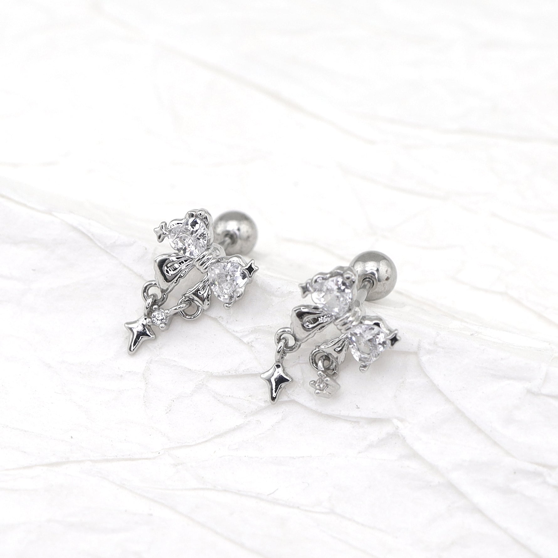 20G Thin Bow Dangle Ear Studs ph1
