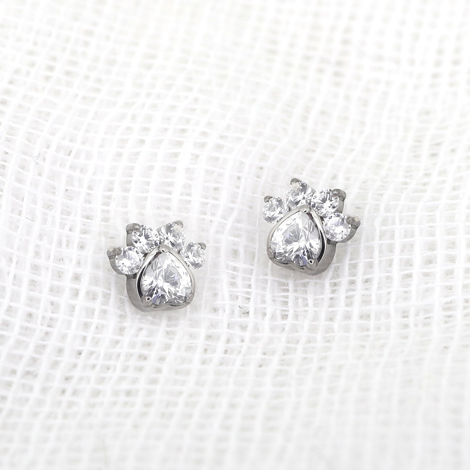 White CZ Cat Paw Titanium Studs ph1